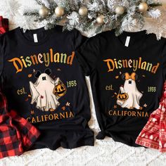 two black shirts with disneyland and california on them