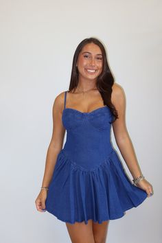 Our 'Kendra' Denim dress features a sweetheart neckline, adjustable straps, corset body, and ruffle skirt detailing. Model is wearing a small. Fits true to size! Size Recommendations 0-4:S, 6:M, 8-10:L All Love <3 Sweetheart Neckline Corset Dress With Ruffles For Date Night, Fitted Blue Denim Corset Dress, Fitted Mini Corset Dress With Ruffle Hem, Fitted Corset Dress With Ruffle Hem, Summer Mini Corset With Ruched Bodice, Flirty Ruffled Corset With Sweetheart Neckline, Flirty Sweetheart Neckline Corset With Ruffles, Ruched Sweetheart Neckline Fit And Flare Corset Dress, Fitted Mini Denim Dress With Ruffles