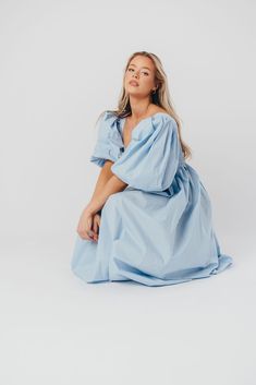 This gorgeous dress is a *vibe* and we are here for it. If you think the Harlow is stunning in photos, wait till you see it in person - this dress will make a statement wherever you go! It features incredible puffed sleeves, a bustier-style structured bodice, and a voluminous skirt. This pastel gem is extra-luxe, and 100% the choice when you're looking to stand out from the crowd. Pair it with a glam set of pumps for a night at the symphony or a black tie wedding, and prepare yourself for the ad Summer Midi Puff Sleeve Dress With Voluminous Skirt, Elegant Blue Puff Sleeve Dress For Day Out, Summer Puff Sleeve Dress With Voluminous Skirt, Blue Midi Dress With Pleated Sleeves For Spring, Summer Voluminous Midi Dress With Balloon Sleeves, Voluminous Puff Sleeve Midi Dress For Summer, Billowy Midi-length Dress For Day Out, Blue Puff Sleeve Dress With Pleated Sleeves For Summer, Summer Puff Sleeve Midi Dress With Voluminous Skirt