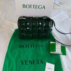 This Bag Is Absolutely Stunning Used Only A Few Times Smoke Free Home Extremely Minute Wear And Tare. Can’t Find A Flaw Really. The Color Says Avocado But To Me It Looks More Like Jade Green. And The So Shiny It Makes It Look Like A Million Dollars Comes With A Box , Duster And Authentication Card Pricing On Receipt Reflects Hawaii’s Special Pricing Purchase At Bottega Venneta Boutique In Alamoana Shopping Center Details : Bottega Veneta Shoulder / Crossbody Bag In Intrecciato Quilted Lamb Leather. Adjustable Shoulder Strap; 50cm / 19.7" Drop Flap Top. Interior, One Zip Pocket. Bonded Lambskin Lining. 7"H X 10.2"W X 3.1"L. Approx. Weight: 1.3 Lb./ 0.6 Kg. Made In Italy. Offers A Green Shoulder Bag With Original Box For Travel, Designer Green Crossbody Box Bag, Designer Green Pouch Box Bag, Padded Cassette Bag, A Million Dollars, Bottega Veneta Bags, Million Dollars, Shopping Center, Jade Green