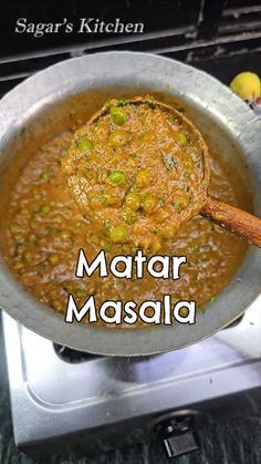 a pan filled with masala sitting on top of a stove