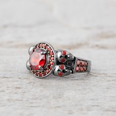 1.35tcw Red Garnet Skull Couple Rings Gothic Wedding Ring Set Elegant Red Skull Ring For Wedding, Red Skull Ring For Anniversary, Elegant Red Skull Ring For Anniversary, Red Gothic Jewelry For Anniversary, Red Halloween Ring, Gothic Red Ruby Promise Ring, Red Ring Jewelry For Halloween, Red Rings For Halloween Gift, Vampire Ring