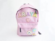 Personalised Backpack Customisable Backpack Letter Backpack Back to school kindergarten backpack Junior gift children Introducing our delightful collection of backpacks, specially designed for young adventurers and ideal for kindergarten and young children. Crafted with utmost care and attention to detail, these backpacks offer the perfect blend of comfort, safety, and style to make every day a joyful exploration. Padded adjustable shoulder straps. Zippered front pocket. Padded back panel. Grab Pink Backpack For Daycare And Back To School, Pink Kawaii Backpack Gift, Playful Pink Softback Backpack, Pink Casual Backpack For Gift, Pink Casual Backpack For Gifts, Pink Backpack For School Events, Casual Pink Backpack For Gift, Cute Pink Backpack For School Events, Pink Softback Backpack For End Of School Year