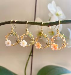 Beautiful, very classy flower Earrings, colour Gold. They have a little bee, a little flower, three gemstones and two tiny flowers on them.  You can choose them with a white flower or a rosa flower. Elegant to wear, and goes with every outfit.  The Wreath is approximately 2.2cm x 2.2cm. Choose between 18K Gold Plated HOOK and the inner layer is stainless steel or Iron HOOK. 🎁All items will come gift-wrapped in a bag and wrapped in quality tissue paper. Perfect as a gift for several occasions su Dainty Gold Jewelry With 3d Flowers, Whimsical Gold Flower-shaped Earrings, Gold 3d Flower Jewelry For Gift, Gold 3d Flower Jewelry Gift, Gold Whimsical Flower-shaped Earrings, Gold Whimsical Jewelry In Flower Shape, Gold Flower-shaped Whimsical Jewelry, Whimsical Gold Flower-shaped Jewelry, Whimsical Gold Hoop Earrings Gift