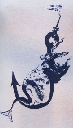 a t - shirt with an image of a man riding a fish in the water