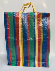 a multicolored shopping bag on a white background