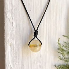 Subtle And Simple, Adjustable Necklace Ft. A Natural Citrine (10mm Or 1/2” Wide) Gemstone Pendant In A Black Waxed Polyester Thread. Finished W/ A Sliding Knot. Natural: Detail/Tone May Slightly Vary! : Adjustable Knot! (Opens Up To 26") #Coachella/Festival/Friendship Gift/Minimalist/Boho/Bohemian/Hippie/Free Spirit/Southwestern/Navajo/Trendy/Kawaii/Vintage/70s/90s/Y2k/Gothic/Rocker/Yoga/Magick/Wicca/Healing Crystal/Amulet/Fairy/Faerie/Occult/Oddities Adjustable Everyday Crystal Necklaces, Adjustable Amber Crystal Necklace Round, Adjustable Round Amber Crystal Necklace, Adjustable Amber Crystal Necklaces, Adjustable Amber Crystal Necklace, Adjustable Yellow Necklace For Everyday, Everyday Adjustable Yellow Necklaces, Adjustable Yellow Necklace With Round Pendant, Adjustable Yellow Round Pendant Necklace