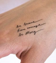 a woman's arm with a tattoo that reads, be brave and have wings