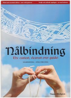 a book cover with two hands holding yarn in front of a blue sky and clouds