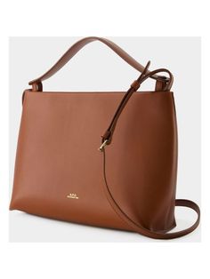 Meet the Ashley Crossbody - the perfect accessory for both your casual and dressy outfits. This versatile bag is the ideal blend of fashion and function, keeping your essentials organized and easily accessible on the go. Dimensions: Width: 27.5cm, Height: 20.5cm, Depth: 9.5cm Brown Satchel With Round Handle For On-the-go, Classic Everyday Bag With Detachable Handle, Classic Bags With Detachable Handle For Everyday Use, Brown Bag With Detachable Strap And Round Handle, Brown Work Bags With Detachable Handle, Brown Bags With Detachable Strap And Round Handle, Brown Top Handle Bag For Work, Brown Workwear Bags With Detachable Handle, Everyday Brown Satchel With Round Handle