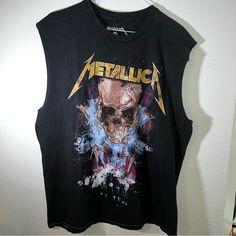 Nwt Unisex Metallica Graphic T-Shirt. Medium / 19.5 Width. Faded Look And High Quality Graphic. Black Edgy Sleeveless Graphic T-shirt, Edgy Sleeveless Graphic Print T-shirt, Grunge Tank T-shirt For Summer, Summer Grunge Tank T-shirt, Black Distressed Crew Neck Tank Top, Acid Wash Distressed Sleeveless Top, Distressed Sleeveless Top For Streetwear, Black Grunge Tank T-shirt, Edgy Sleeveless Cotton T-shirt