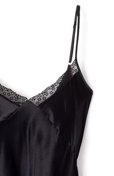 Exude elegance through your morning and nighttime routines in this lace-trimmed nightgown sewn from fluid silk. V-neck Adjustable straps 100% silk Dry clean Imported Satin V-neck Slip Dress With Contrast Lace, Silk Slip Dress With Lace Trim For Night, Sleeveless Satin Slip Dress With Contrast Lace, Lace Camisole Slip Dress For Night, Elegant Black Slip Dress With Delicate Lace, Silk Nightgown With Lace Trim For Sleep, Silk Sleep Dress With Lace Trim, Black Satin Camisole With Lace Trim, Silk V-neck Nightgown For Night