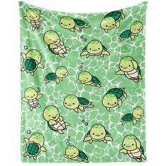 a green blanket with turtles on it