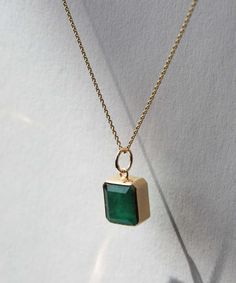 An emerald cut emerald set in 14k yellow gold. Each emerald has colors and textures unique to each stone. Specifications: 4 ct emerald set in 14k yellow gold. Stone is approximately 9.5x11 mm. Chain sold separately. Browse other chains here. Add our Carabiner to complete your look. Greenpoint Brooklyn, Emerald Set, Bezel Necklace, Tourmaline Pendant, Bezel Pendant, Gold Stone, Yellow Gold Chain, Pear Diamond, Diamond Studs