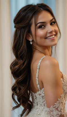 a woman with long hair wearing a wedding dress