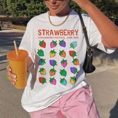 Nature's candy: Celebrate the sweetness of strawberries with this trendy tee! Made with comfy fabric, this shirt is perfect for expressing your creativity and letting the world know you appreciate the finer things. PRINTED ON COMFORT COLORS * 100% ring-spun cotton * Medium fabric (6.1 oz/yd² (206.8 g/m * Relaxed fit * Sewn-in twill label CARE INSTRUCTIONS: * Wash inside-out with like colors * Cold water * Dry on low to medium heat SIZING * Unisex sizing * These fits are very standard, and as suc Cheap Trendy Tops With Fruit Design, Cheap Trendy Strawberry Print Shirt, Cheap Pink T-shirt With Fruit Print, Cheap Fruit Print Tops For Summer, Cheap Crew Neck Tops With Fruit Design, Cheap Pink Fruit Print T-shirt, Cheap Fruit Design Tops For Spring, Strawberry Clothes, Strawberry Gifts