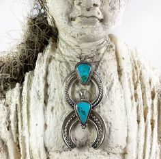 This handcrafted beautiful Naja Pendant-Necklace features a fabulous piece of 'Turquoise Mountain' Turquoise, sourced from Arizona. The pure silver bezel holds the stone securely in place, while the remaining silver elements, such as star-clad detail, backing, bail, and Naja base, are all expertly crafted from high-quality 925 sterling silver. The design is accentuated by heavily oxidizing, sanding, and highly polishing the silver. This timeless Naja necklace is a must-have for any collection! Stone: Turquoise Mountain Pendant (inc. bail): 2" L x 1.65"W Necklace: SS Rolo Chain Chain Length: 16", 18", 20" or 24" Materials: Fine Silver & Sterling Silver Stamped .925 & custom Makers Mark Handcrafted in CT, USA by MEM One-of-a-kind & Ready to Ship This listing is for (1) Necklace only Include Naja Necklace, Mountain Pendant, Naja Pendant, Raven Jewelry, W Necklace, The Pure, Rolo Chain, The Stone, Pure Silver