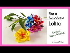 three origami flowers are sitting next to each other on a white surface with the words, flor e kusudaama lollita