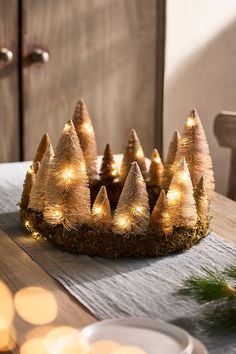 a lighted crown sits on top of a table