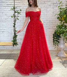 Crimson Galaxy Gown | Teuta Matoshi Red Prom Dress Sparkly, Long Red Prom Dress, Star Prom Dress, Prom Dress With Pockets, Prom Dresses Off The Shoulder, Sparkly Prom Dress, Prom Dresses With Pockets, Long Evening Gowns, Red Prom