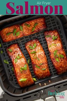 salmon cooking in an air fryer with text overlay