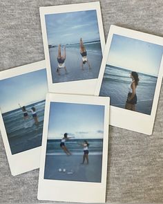 four polaroid photos of people playing in the water at the beach on a gray blanket