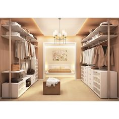 a walk in closet filled with lots of white furniture