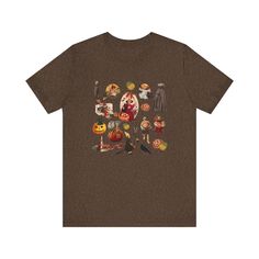 a brown t - shirt with an image of halloween characters and pumpkins on it