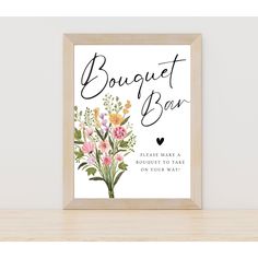 a bouquet bar sign hanging on a wall next to a wooden shelf with a vase filled with flowers