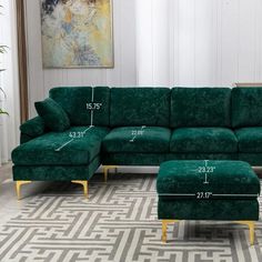 a green sectional couch with measurements for the seat and footrests, sitting on a patterned rug