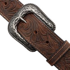 Product Details: Traditional tooled billets western belt Decorative engraved buckle Brown Belt width: 1 1/2" Buckle finish: Antique silver Includes snaps that allow you to change out the buckle Note: Western belts tend to run small, please consider when ordering Luxury Hand-tooled Belts For Formal Occasions, Luxury Hand Tooled Silver Belt, Luxury Antique Belt Buckles For Formal Occasions, Luxury Logo Belt Buckles For Formal Wear, Luxury Bridle Leather Belts For Formal Wear, Luxury Custom Concho Belt Buckles, Luxury Hand Tooled Adjustable Belts, Luxury Engraved Belt Buckles For Formal Occasions, Cheap Leather Belt With Buckle Closure