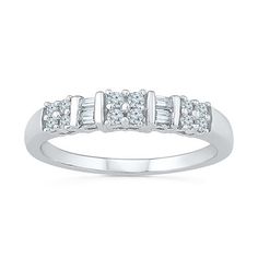 Ring Style: BandsDiamond Clarity: I2-I3Setting: ProngStone Cut: RoundDiamond Color: I-JMetal Color: WhiteRounded Carat Weight: 1/4 Ct. T.w.Band Width: 2mmCare: Wipe CleanAuthenticity: Natural DiamondBirthstone: April BirthstoneMetal: Sterling SilverCountry of Origin: Imported White Diamond Half-eternity Ring, White Half Eternity Diamond Ring For Anniversary, White Diamond Ring Channel Set For Promise, Classic White Stackable Rings With Pave Setting, Classic White Cluster Ring For Promise, White Stackable Promise Rings With Prong Setting, White Classic Cluster Promise Ring, White Stackable Promise Rings With Diamond Accents, White Stackable Rings For Promise With Prong Setting