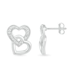 Capture a charming new style with the playful details of these diamond accent double interlocked heart stud earrings. Crafted in sterling silver Each earring showcases a heart-shaped outline shimmering with diamond accents and beaded details. A polished open heart interlocks at the bottom in a playful tilted design. These post earrings secure comfortably with friction backs. Fine Jewelry Double Heart Earrings With Diamond Accents, Silver Heart Earrings With Diamond Accents For Anniversary, Sterling Silver Double Heart Earrings Fine Jewelry, Sterling Silver Double Heart Earrings, Anniversary Double Heart Earrings With Diamond Accents, Anniversary Heart Earrings With Diamond Accents, White Gold Double Heart Diamond Earrings, Valentine's Day Sterling Silver Heart Earrings With Diamond Accents, Silver Double Heart Diamond Earrings