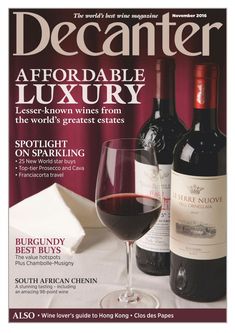 a magazine cover with two bottles of wine and a glass of wine next to it