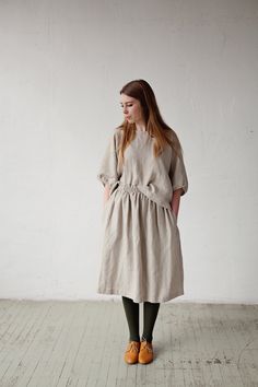 Below the knee skirt is made from 100% soft and washed linen. This Petticoat is perfect for wearing under dress or other skirt or can be worn alone. Match it with our tunics! Details: - Composition: 100% Oeko-Tex certified linen - Colour: natural - Elastic waist - Pockets - Size: One size/fits all - Medium weight linen - Linen care: machine wash gentle; tumble dry low, ironing optional - The price is for one skirt, other pictured items are not included Linen Skirt Midi, Oversized Linen Shirt, Linen Midi Skirt, Below The Knee Skirt, Natural Buttons, Skirt Linen, Summer Tunic, Knee Skirt, Plus Size Shirt