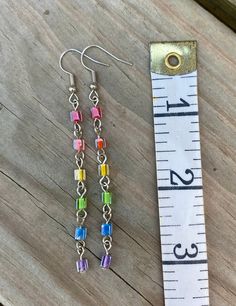 Cheap Silver Earrings With Colorful Beads, Multicolor Metal Dangle Crystal Earrings, Rainbow Nickel-free Earrings For Gifts, Rainbow Nickel-free Drop Earrings, Nickel-free Rainbow Earrings For Gift, Nickel-free Rainbow Drop Earrings, Nickel-free Rainbow Earrings Gift, Silver Earrings With Colorful Beads, Rainbow Metal Earrings With Ear Wire