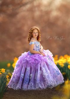 Whimsical Purple Wedding Dress, Purple Tulle Dress For Pageants, Whimsical Fitted Lavender Dress, Spring Purple Gown With Fitted Bodice, Purple Gown With Fitted Bodice For Spring, Spring Gown With Fitted Bodice In Purple, Elegant Lavender Princess Dress For Pageants, Lavender Tulle Dress For Pageants, Luxury Lavender Ball Gown Dress