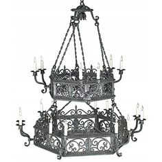 an old fashioned chandelier with candles hanging from it's center and bottom