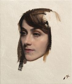 a painting of a woman's face with brown hair