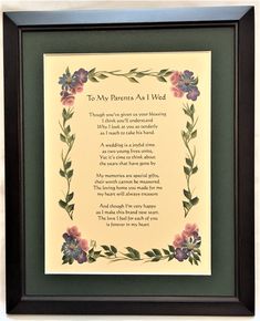 a framed poem with flowers and leaves on the border, in a black frame that says a nurse's prayer