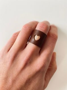 Handcrafted unique leather accessory in variable sizes Minimalist Brown Jewelry For Gift, Minimalist Brown Jewelry As Gift, Minimalist Brown Jewelry As A Gift, Unique Brown Jewelry For Everyday, Heart-shaped Leather Jewelry For Gifts, Heart-shaped Leather Jewelry Gift, Minimalist Brown Rings For Gifts, Modern Brown Ring Jewelry, Unique Brown Rings For Gift