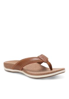 Get both style and comfort with the Camden thong sandal. Classic thong sandal with a full-grain leather upper and soft fabric lining for barefoot comfort. Lined, contoured cushioned footbed for all day comfort and support. Rubber outsole for great comfort, slip resistance and durability.Leather UpperFabric LiningRubber Outsole1 1/4" Heel heightFlip Flop available in sizes Medium 6,7,8,9,10,11 | Women's Camden Flip Flop by Eastland in Tan (Size 11 M) Leather Toe Post Flip Flops For Outdoor, Casual Open Toe Sandals With Leather Trim, Leather Toe Post Flip Flops With Arch Support, Leather T-strap Sandals With Arch Support, Casual T-strap Sandals With Arch Support, Casual T-strap Flip Flops With Arch Support, Leather T-strap Sandals With Cushioned Footbed For Beach, Comfortable Toe Loop Flip Flops With Leather Footbed, Comfortable T-strap Sandals With Cushioned Footbed