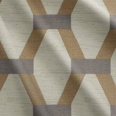 an upholstered wallpaper pattern in beige and grey colors with geometric shapes on it