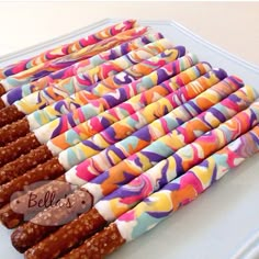 there are many candy sticks on the table