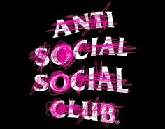 the words anti social social club are painted in pink and white on a black background