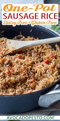 one pot sausage rice is in a skillet with a wooden spoon on the side