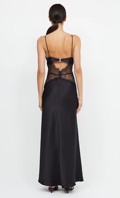 Effortless and elegant, the Camille Maxi Dress is a refined style with sweet lace panel detailing. The dress features classic triangles on the bodice with an underbust cutout, and thin roulea straps that lead to a flattering open back silhouette.FIT: designed to be fitted at the bust and hips, falling into a relaxed fit through skirt. Maxi dress is accessed through E-hook hardware at back, not bra friendly. Fabric offers no stretch to the fit. • Main – 100% polyester. Contrast – 58% nylon, 42% rayon Back Silhouette, Camille Dress, Sorority Formal, Bec & Bridge, Refined Style, Lace Panelled, Long Sleeve Midi Dress, Black Maxi Dress, Black Tie