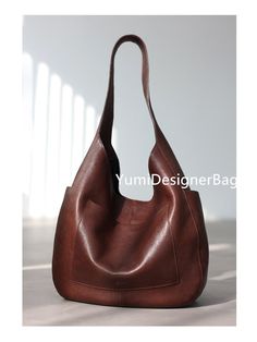 100% Nature Top layer Genuine Leather with Waxed. 100% Handmade. Materials: Genuine leather, High quality leather, Durable genuine leather ,inside is the High quality pure cotton Two colors : Brown ,Black  FEATURES: - Height: 10.63 inches (27 cm) - Length: 12.2 inches (31 cm) - Handles: 11.02 inches (28 cm) - Bottom width:3.94 inches (10 cm) - Bag weight 0.55 kg - 2 interior and 2 exterior pockets NOTE: PLEASE LEAVE A CONTACT PHONE NUMBER FOR DELIVERY THROUGH Express. ●I and my sister Daisy are Unusual Christmas Gifts, Leather Hobo Bags, Hobo Bags, Leather Handbags Women, Handbags Women, Etsy Personalized Gifts, Leather Hobo Bag, Hobo Handbags, Cute Bags