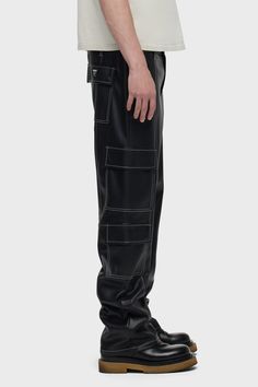 Description Our Vegan Leather Baggy Cargo in Black Sky is cut from luxe, vegan leather with contrast stitching and cargo details including side and back patch pockets. For a less roomy fit, size down. Product Details Front Rise: 12.25", Leg Opening: 18.5", Inseam: 32"Model Height 6’1"Model wearing size 32 Fit & Care Content: 100% PolyeurethaneMachine wash cold with like colorsDo not bleachTumble dry low or hang to dry Leather Cargo Pants, Black Sky, Black Cargo Pants, Into The Night, Black Cargo, Kick Flares, Denim Branding, Men Fits, Hudson Jeans