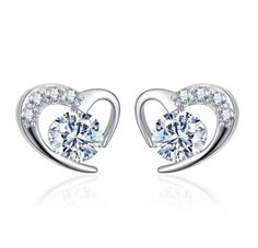 You will feel like you are wearing expensive diamond earrings when you put these elegant studs on! Made with 925 Sterling silver and white gold with clear cubic zirconia that sparkles like a diamond in the light These silver earrings are exquisite, but are also sturdy and built for longevity. Perfect for every occasion Kpop Soloist, Sterling Silver Heart Earrings, Silver Heart Earrings, Purple Diamond, Ear Earrings, Birthday Jewelry Gift, Heart Studs, Paros, Heart Earrings Studs